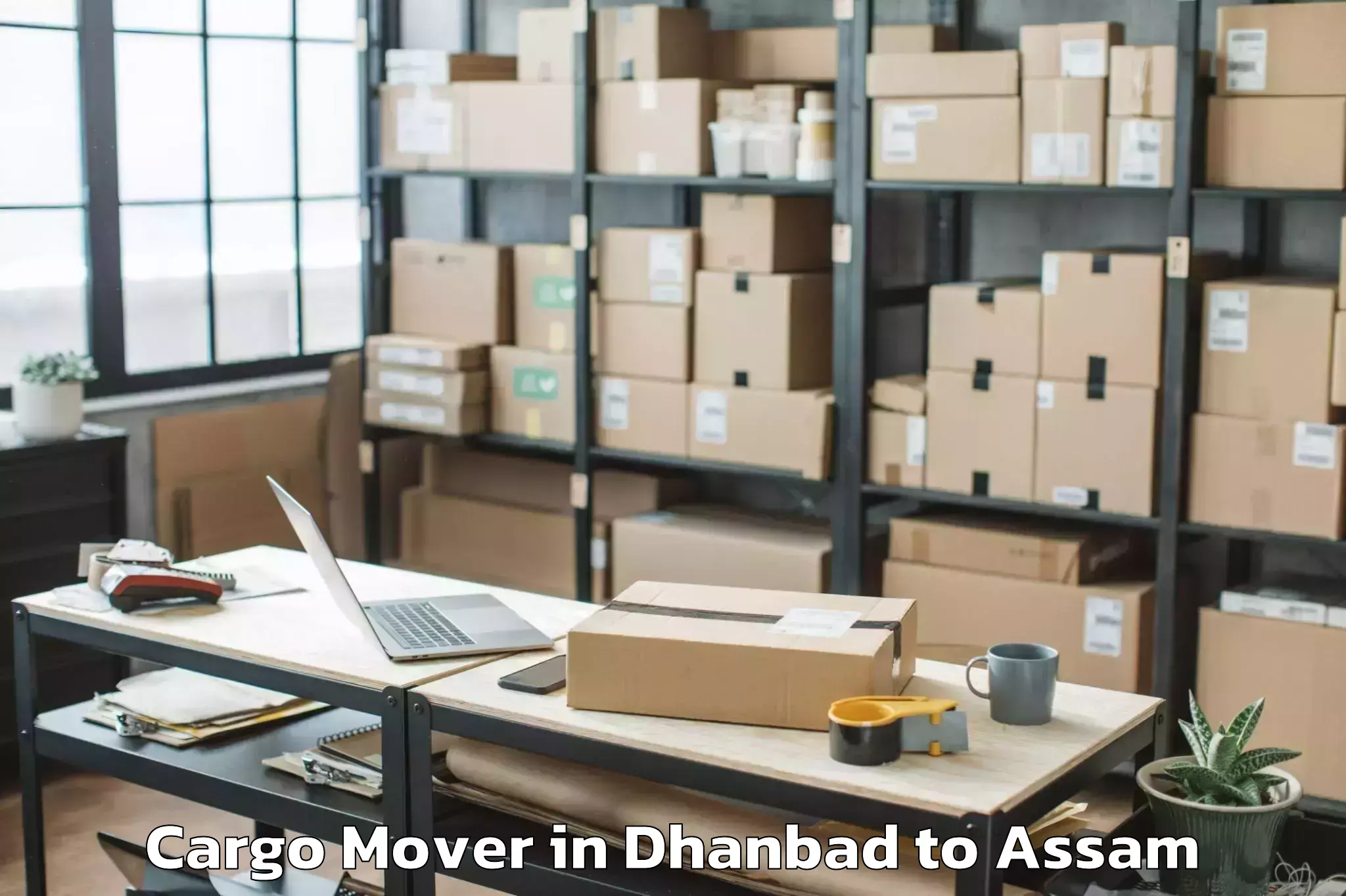 Dhanbad to Kampur Town Cargo Mover Booking